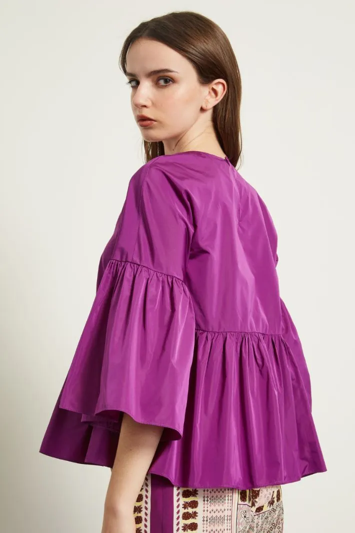 Blusa in taffetà con balza