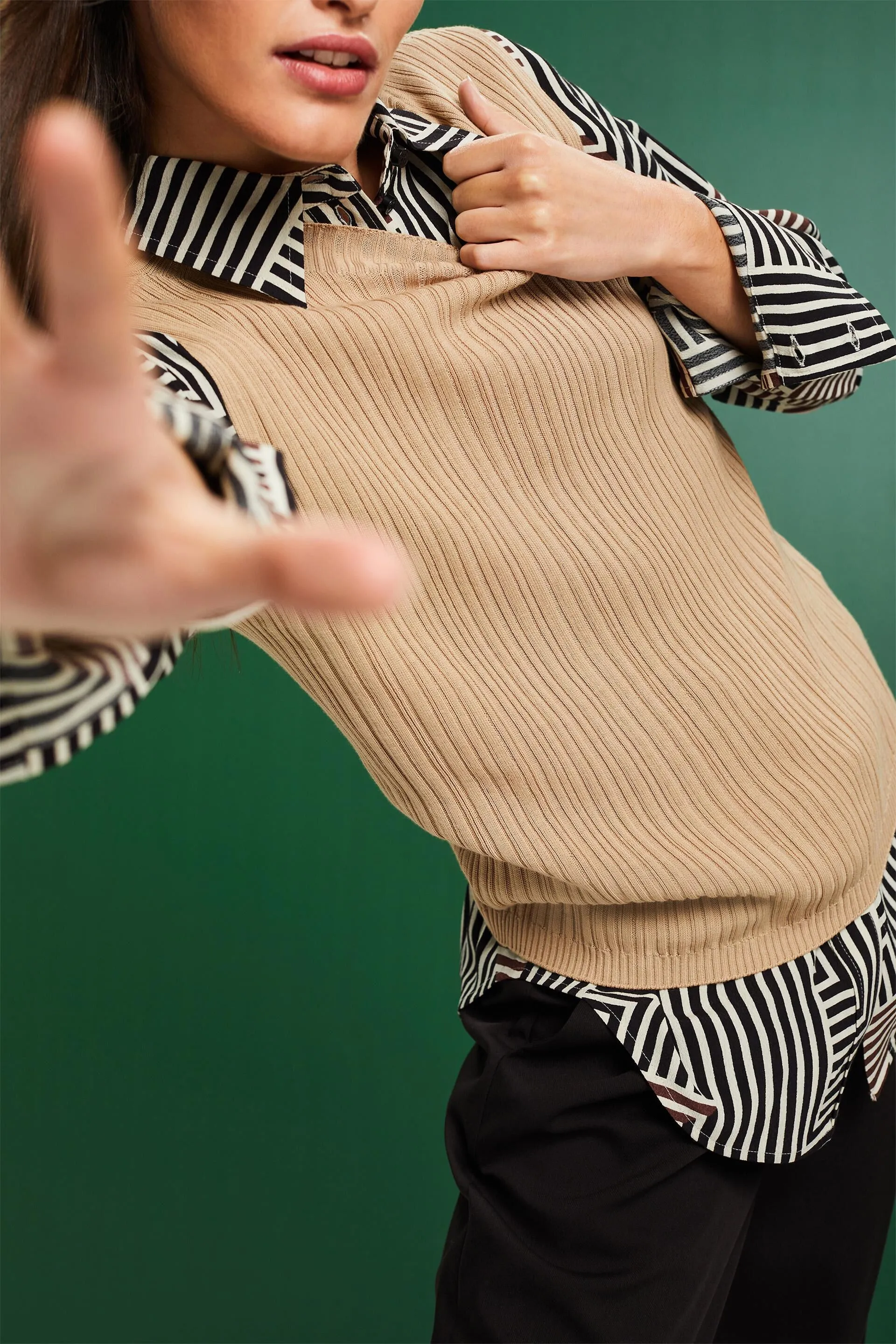 Pullover smanicato a coste