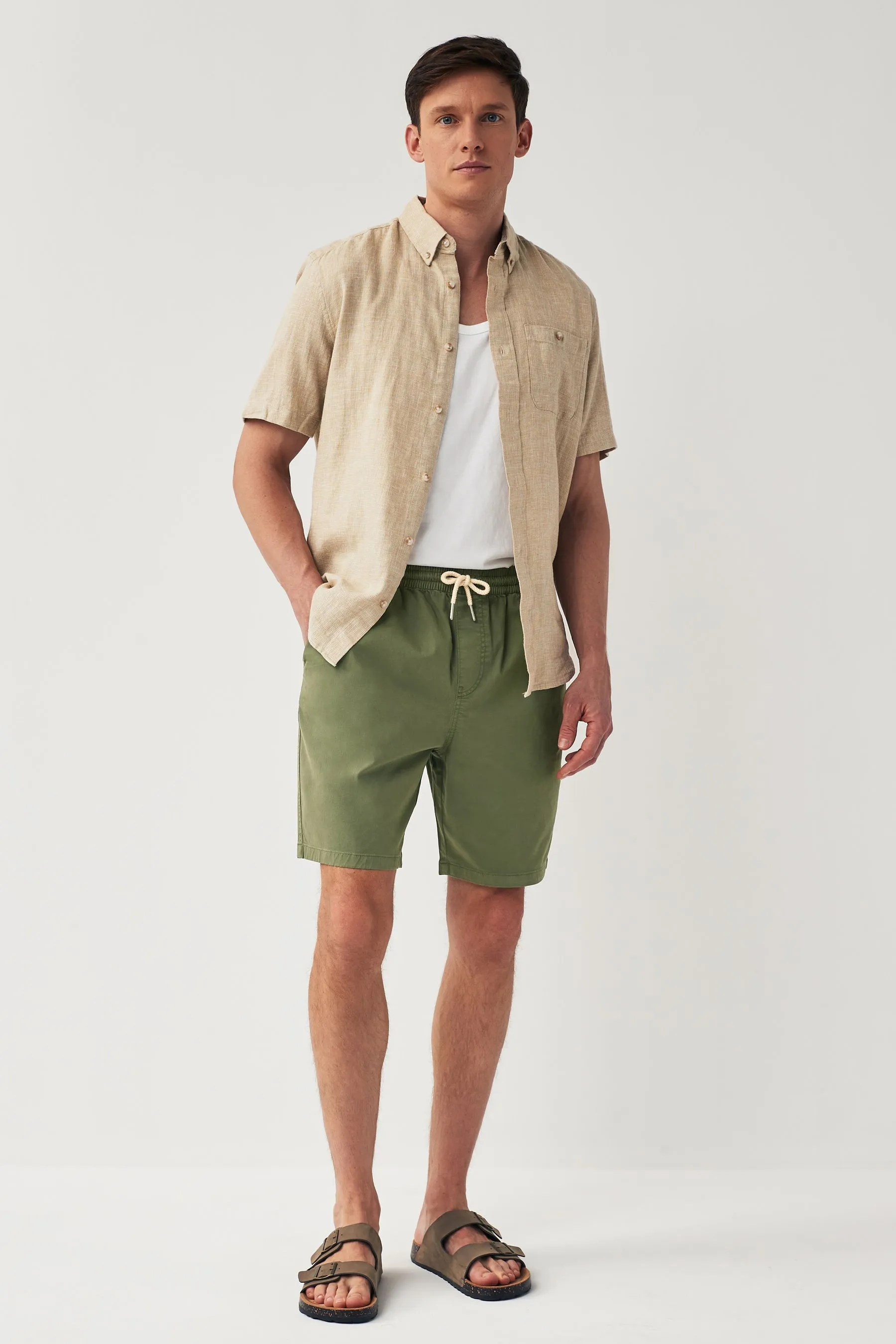 Shorts in cotone slavato con vita elasticizzata