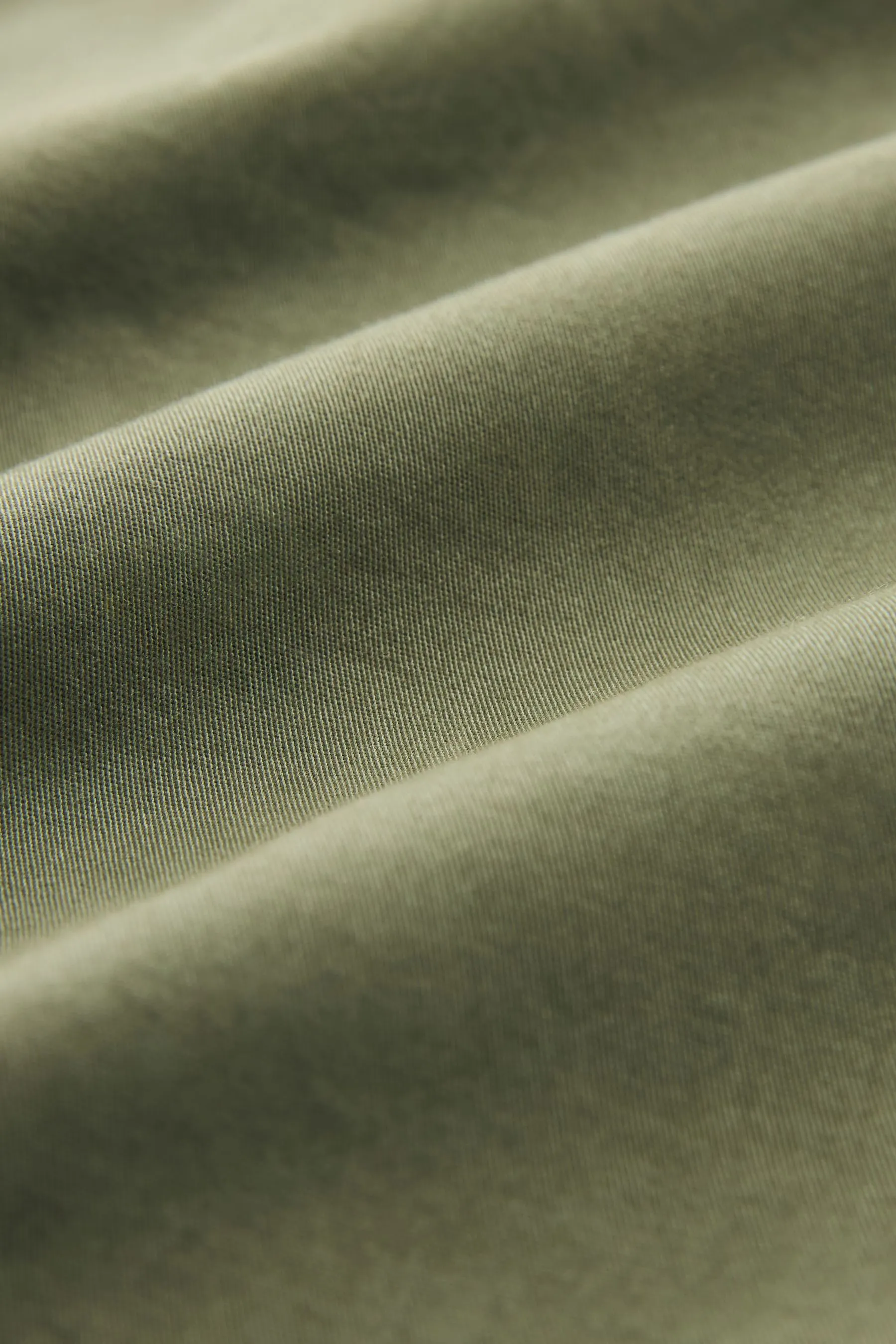 Shorts in cotone slavato con vita elasticizzata